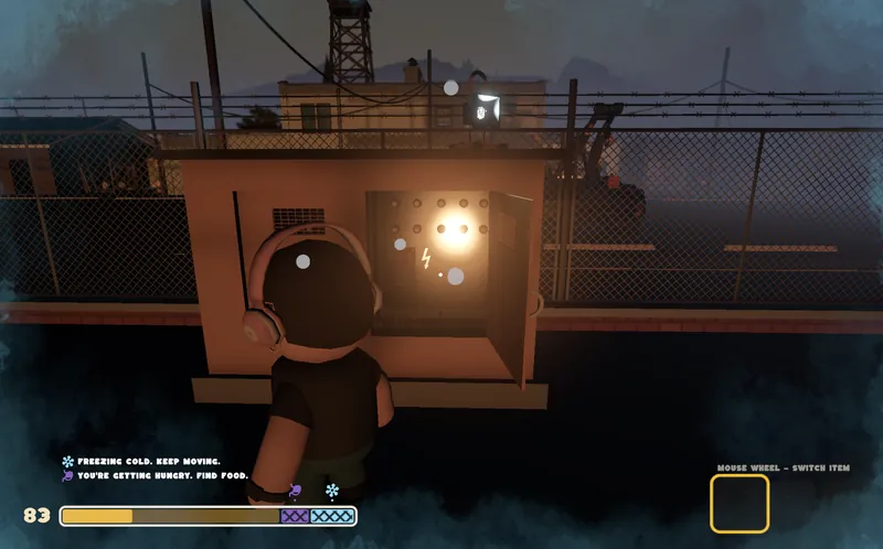 At night, a player stands at a glowing electrical box behind a chain-link fence