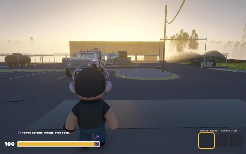 A player crossing an empty parking lot at sunset