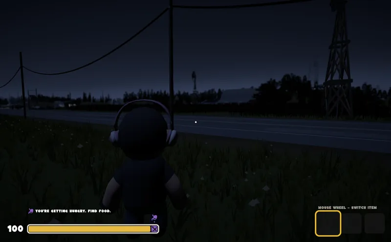 A player at night by the road with power lines and a radio tower